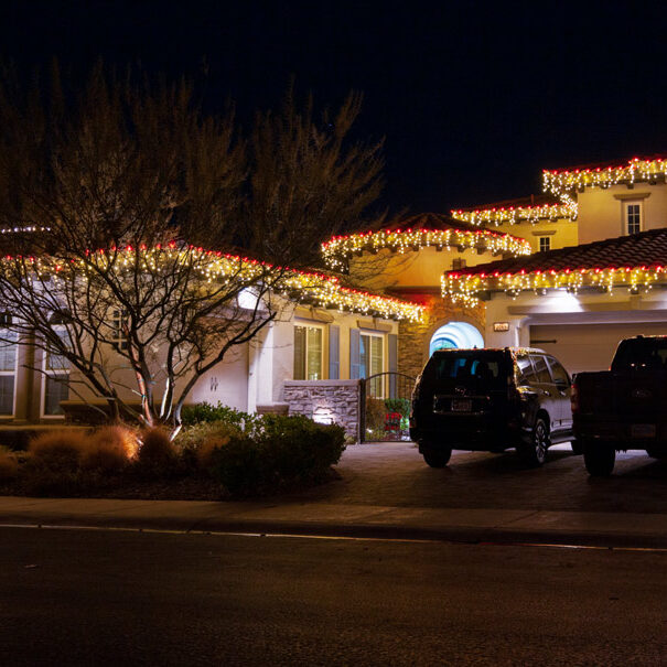 Red c-9 bulbs over warm white icicles